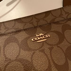 Authentic signature Coach crossbody/over the shoulder purse.